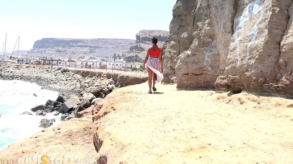 15P Caucasian girl Chloe Lamour takes a piss while walking upon a seaside cliff