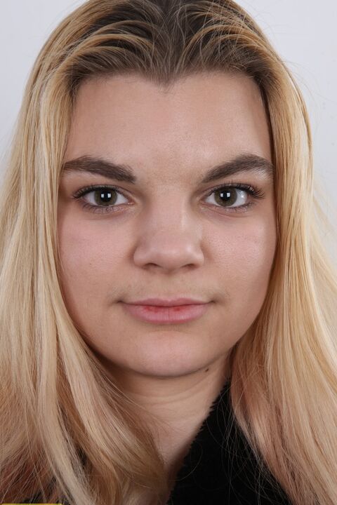 12P Chunky blonde girl Aneta stands fully clothed and then as naked as one can get