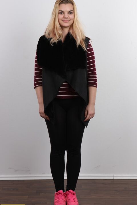 12P Chunky blonde girl Aneta stands fully clothed and then as naked as one can get