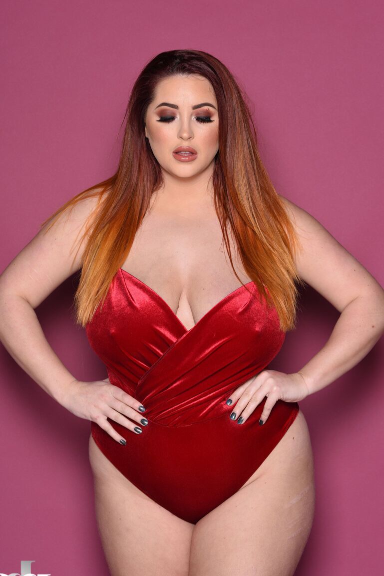 21P Lovely British fatty Lucy Vixen caressing her bountiful natural breasts