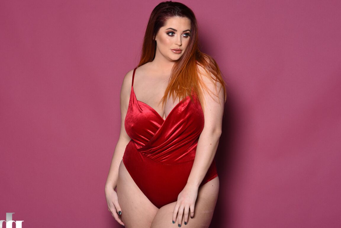 21P Lovely British fatty Lucy Vixen caressing her bountiful natural breasts