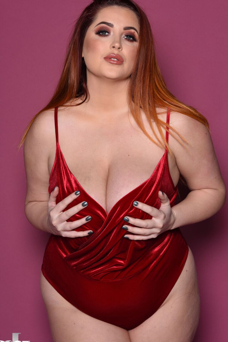 21P Lovely British fatty Lucy Vixen caressing her bountiful natural breasts