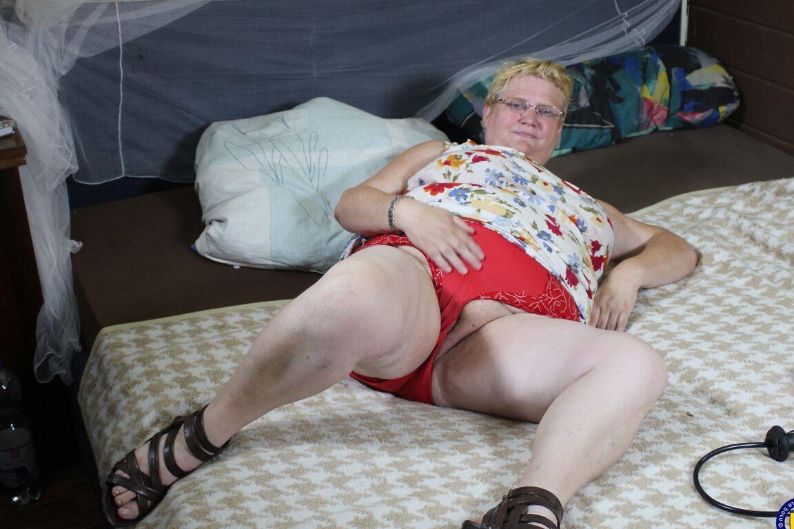 21P Fat blonde grandma Edeltrud undresses and masturbates in a solo