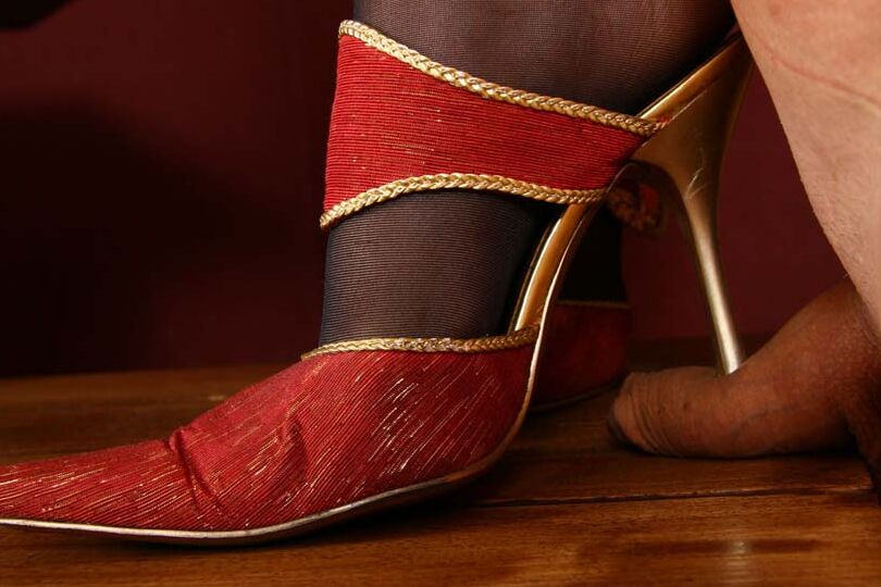 16P Two bossy bitches trample boy's cock without taking off their spike heeled
