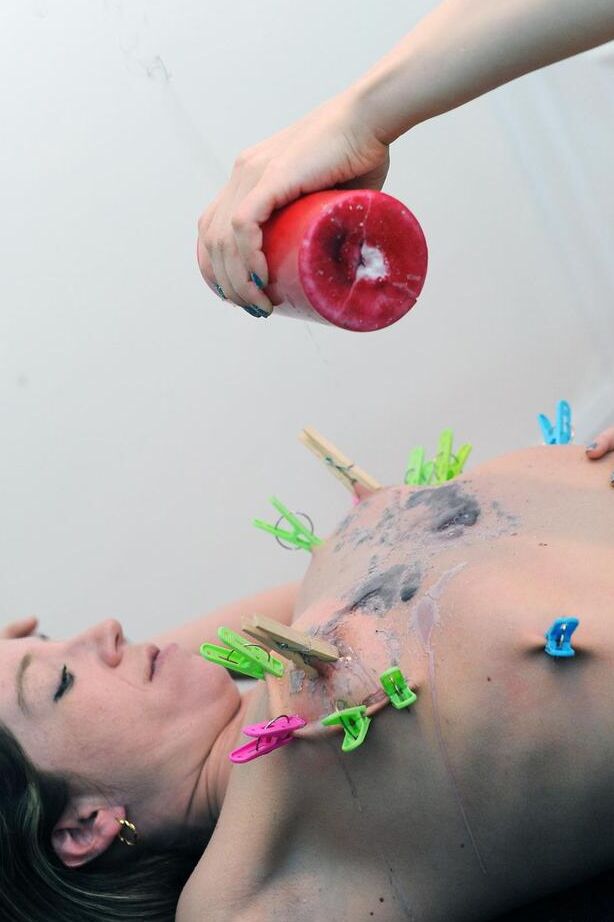 16P Blond chick in a nurse's cap and lingerie tortures a woman with wax and clamps