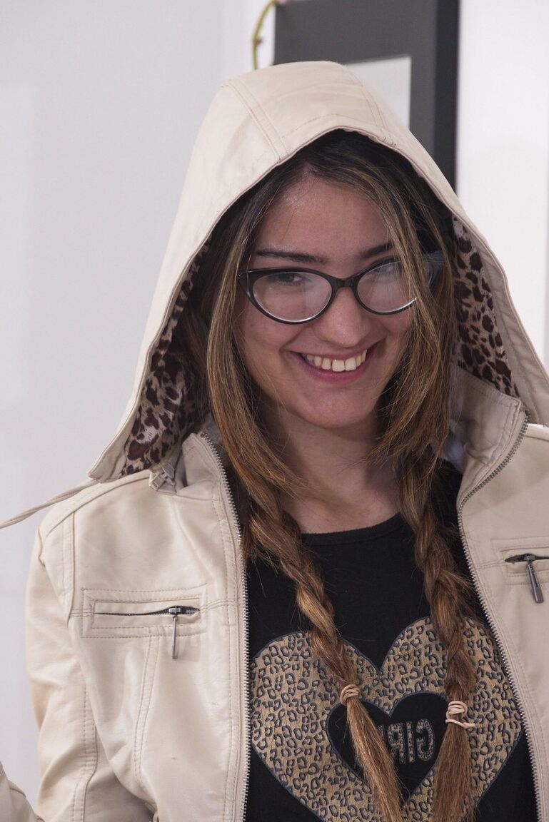 16P Amateur chick Charly plays with her braided pigtails while showing her bush
