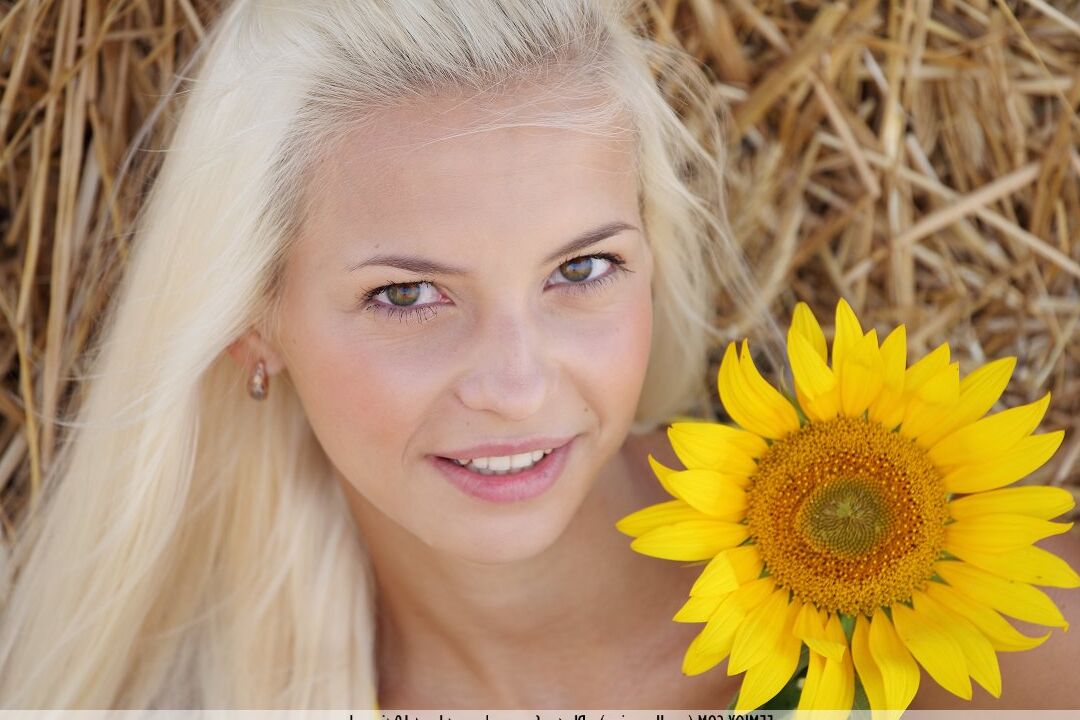 16P Nice blonde girl Vika D shows off her bald twat afore a round bale