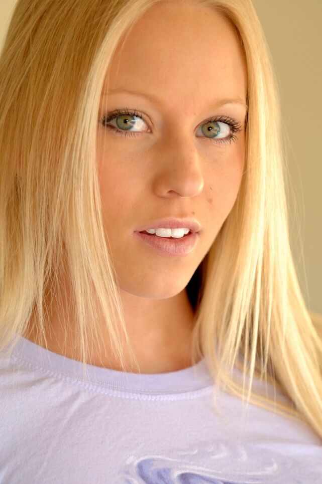 21P Skinny blonde Mary flashes her tiny boobs and tight ass in a solo striptease