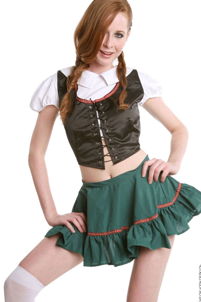 15P Redhead chick Lucie T strips off her uniform in over the knee nylons
