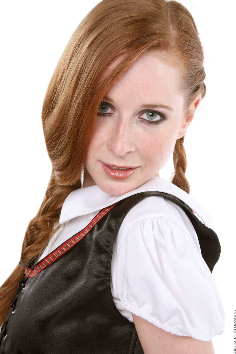15P Redhead chick Lucie T strips off her uniform in over the knee nylons