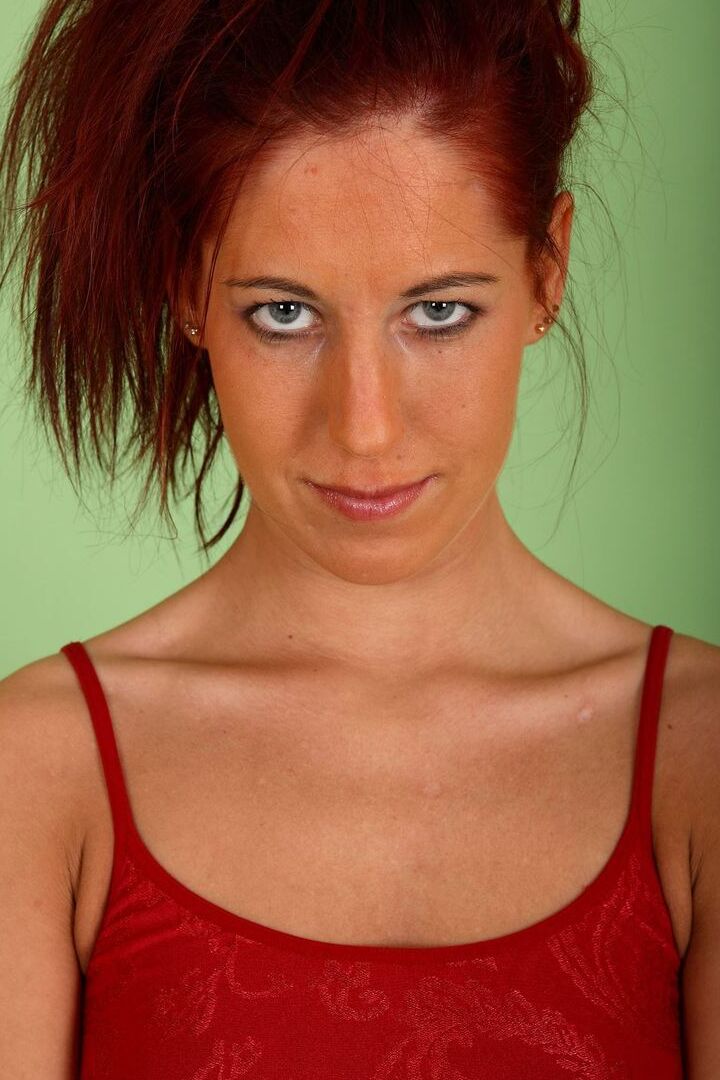 16P Skinny redhead Susy Rocks takes a big dildo to her shaved vagina