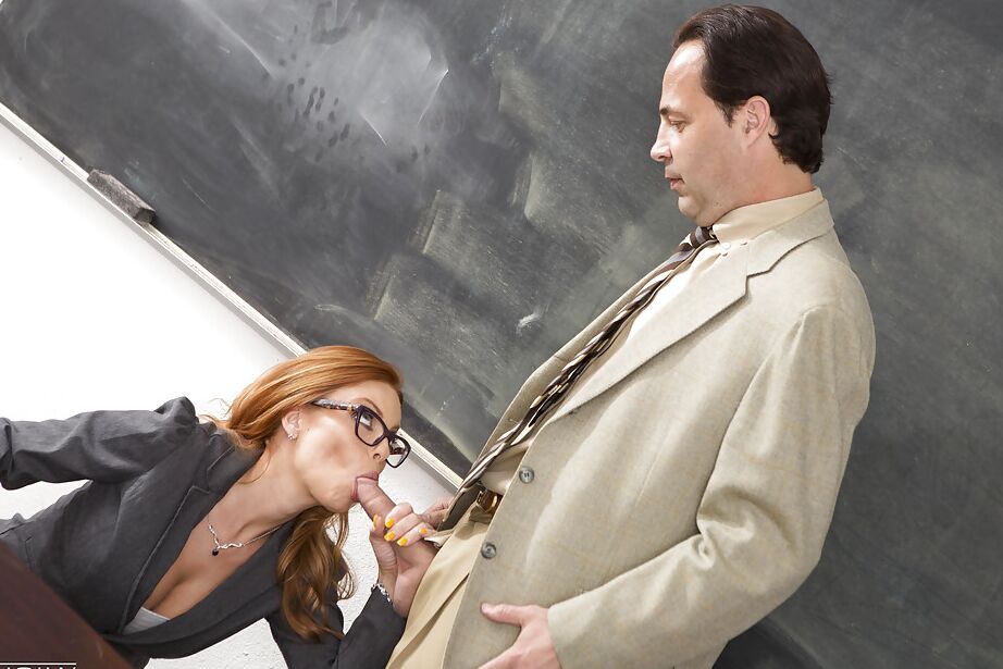 16P Nerdy redhead teacher Britney Amber sucking cock and balls in classroom