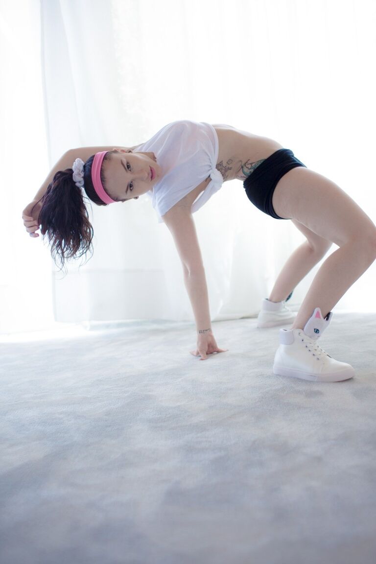 16P Short brunette Gabriella Paltrova bends over and shows her sexy booty