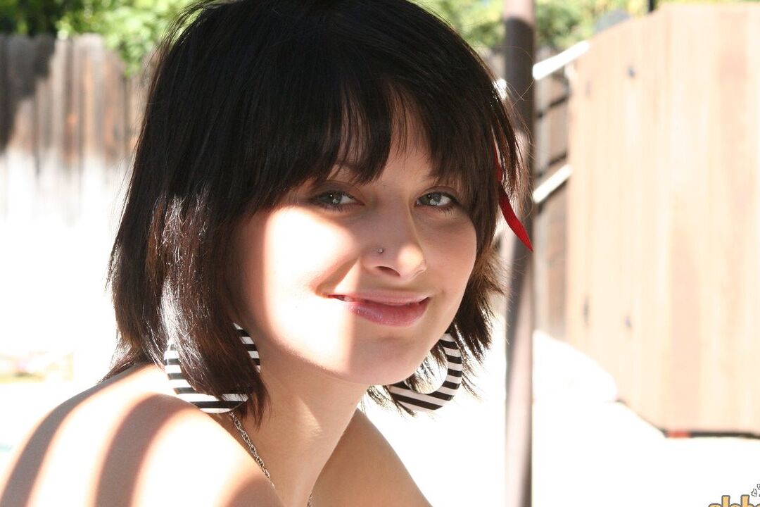 16P Brunette MILF Ellie Idol frees her naked body from bath towel while smoking
