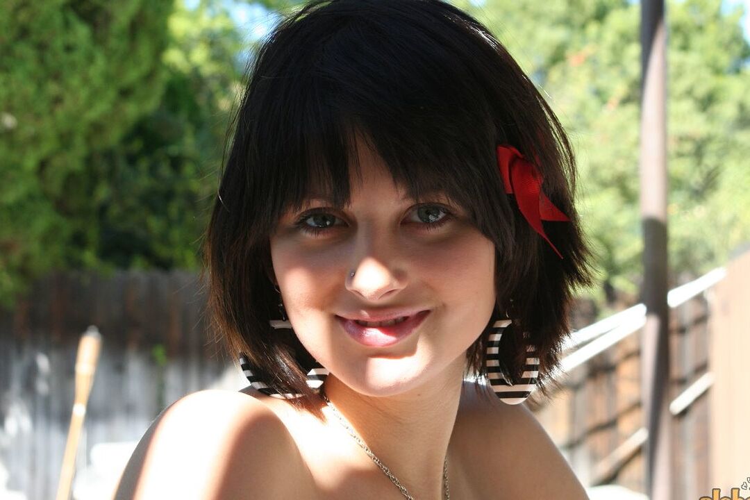 16P Brunette MILF Ellie Idol frees her naked body from bath towel while smoking