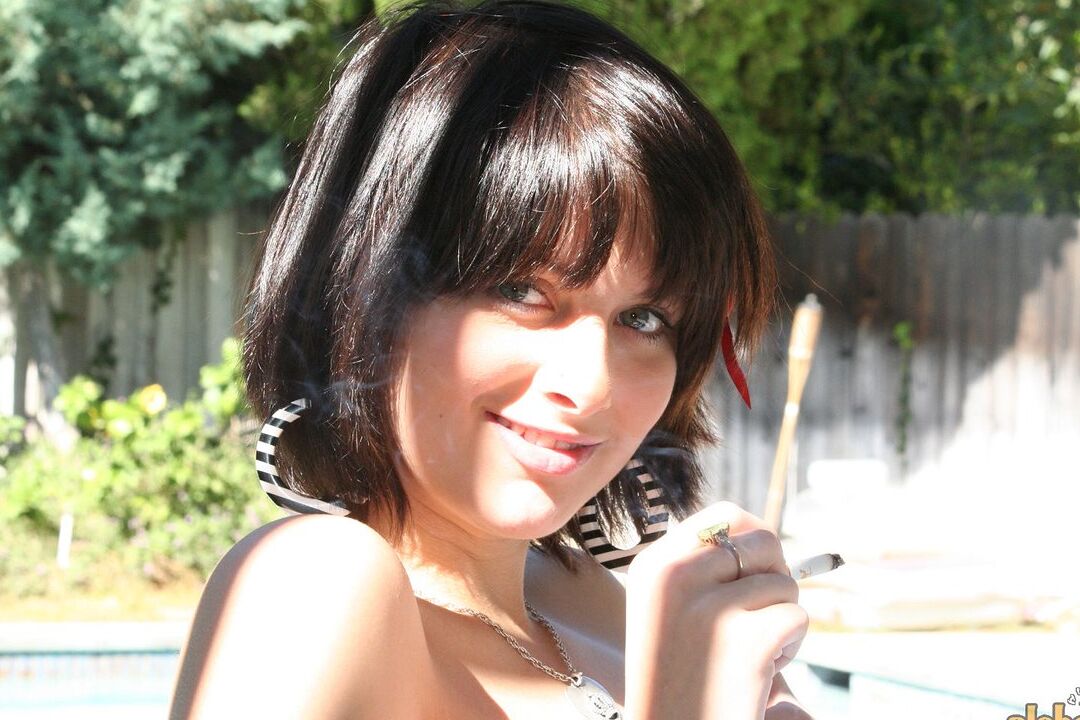 16P Brunette MILF Ellie Idol frees her naked body from bath towel while smoking