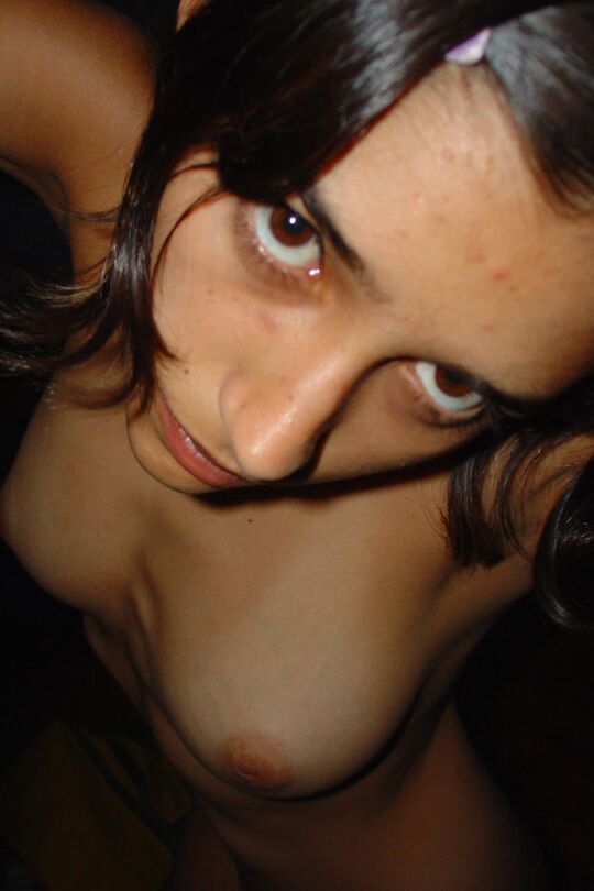 10P Pretty Indian girl is captured in the nude during candid action at home
