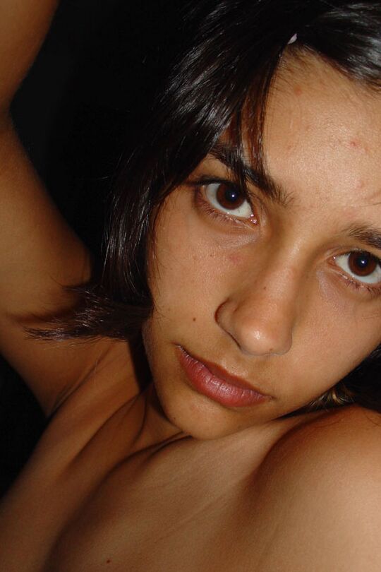 10P Pretty Indian girl is captured in the nude during candid action at home