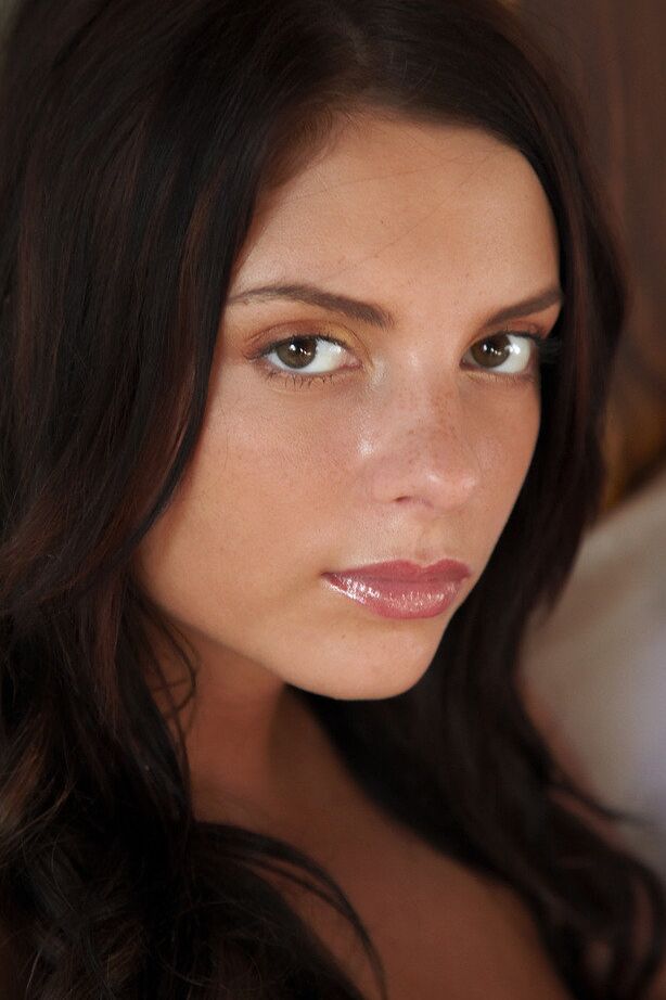 18P Young brunette Anastasia C poses totally nude while on top of her bed