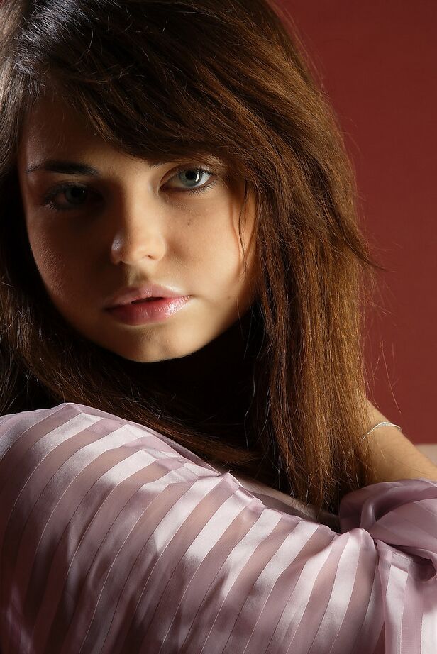 12P Hot young girl with pretty face undressing to show small tit with puffy nips
