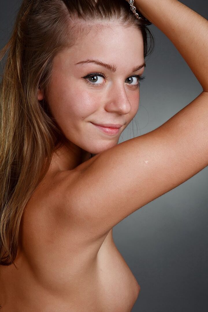 16P Hot ass doll Natalia E models her tiny small tits close up & kneels on a chair