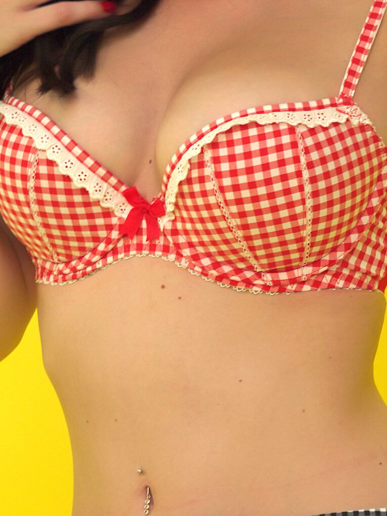 17P Pretty brunette sports red lips while taking self shots as she disrobes