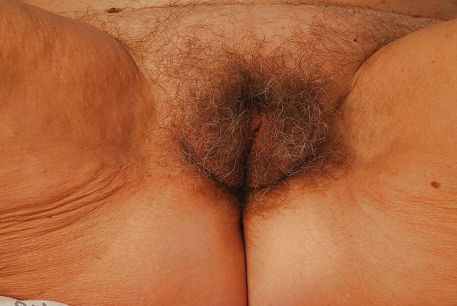 16P Lecherous granny with unshaven cooter getting naked and spreading her legs
