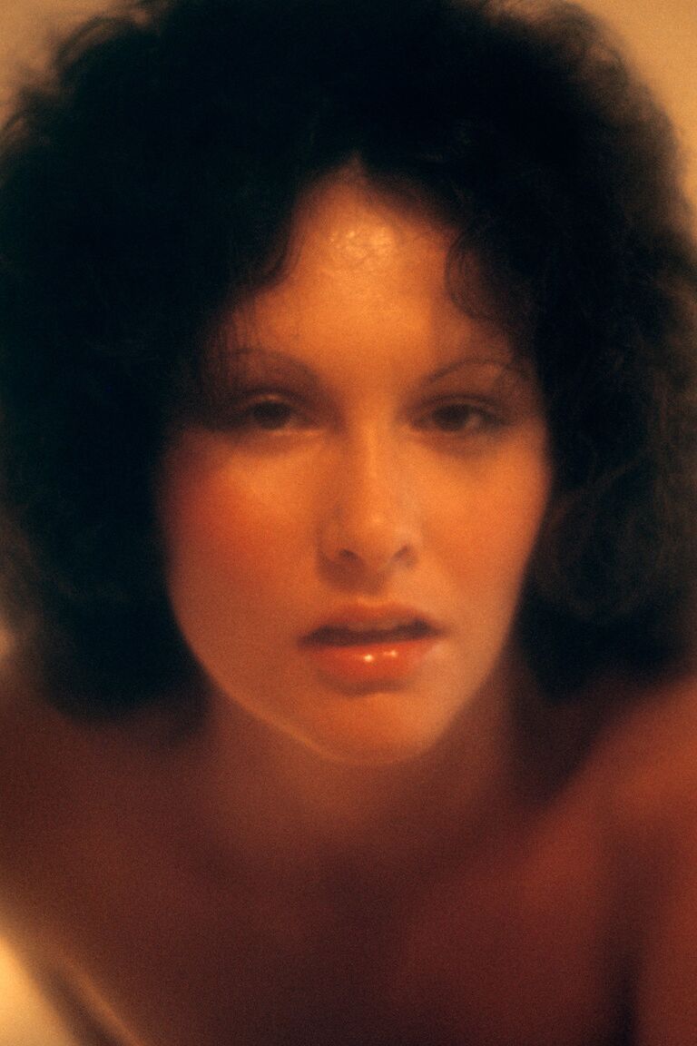 16P Classic retro centerfold Linda Lovelace enjoys solo masturbation on her bed