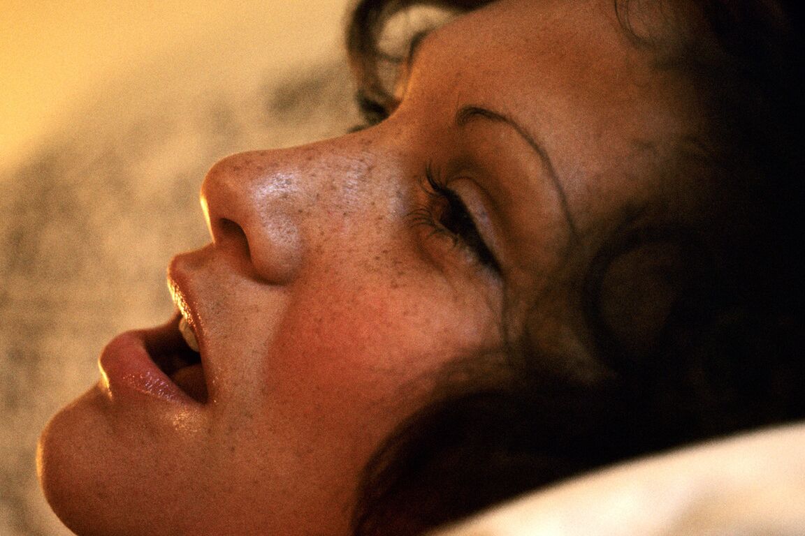 16P Classic retro centerfold Linda Lovelace enjoys solo masturbation on her bed