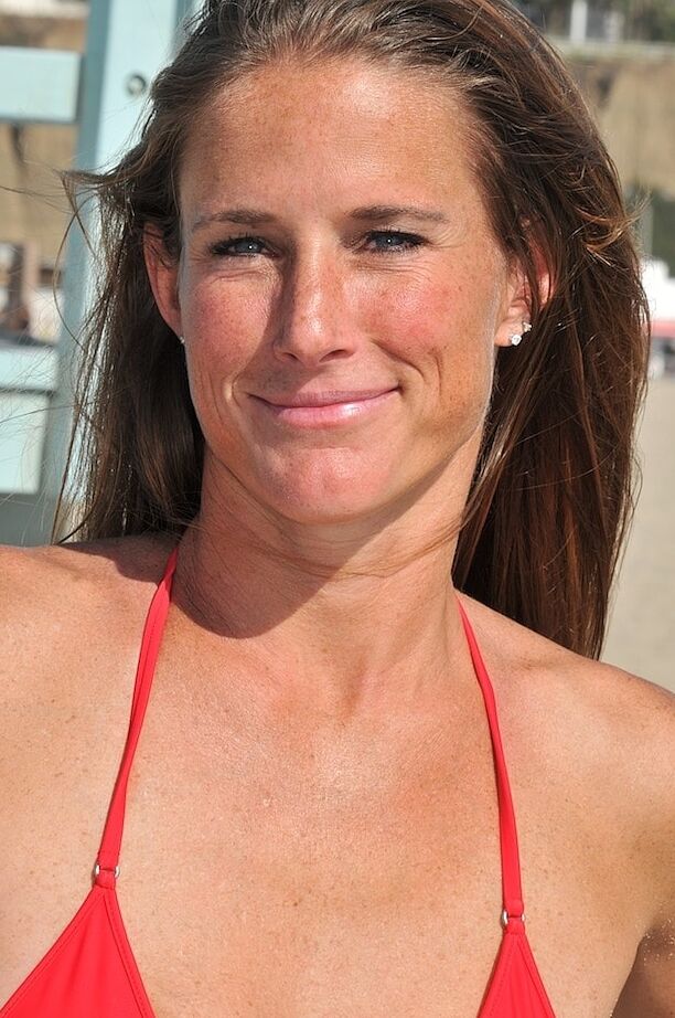 21P Tall MILF Sofie Marie showing off her lean body in a red bikini at the beach