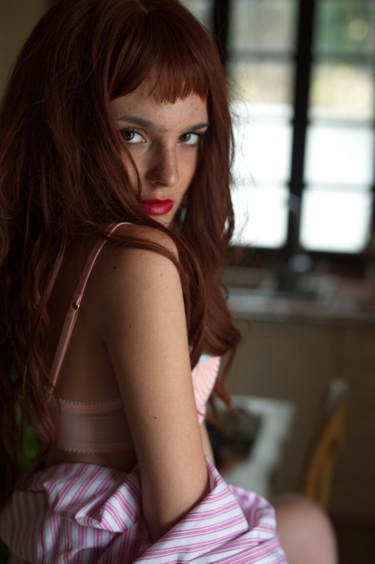 12P Beautiful redhead Caterina Foxy casts alluring looks during a non-nude shoot