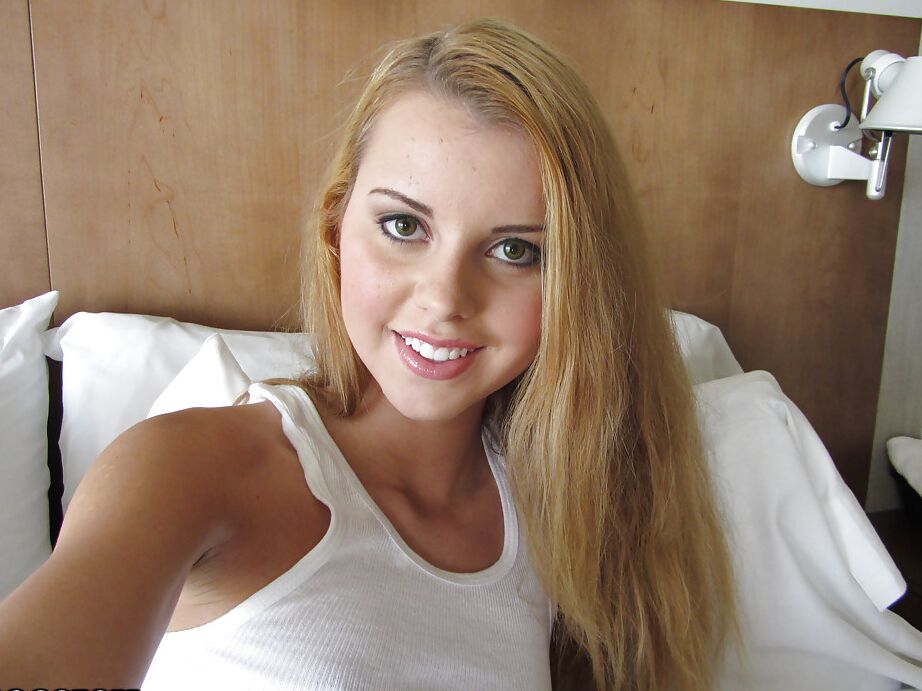 12P Pretty Latina female Jessie Rogers taking selfies of shaved cunt and tiny tits