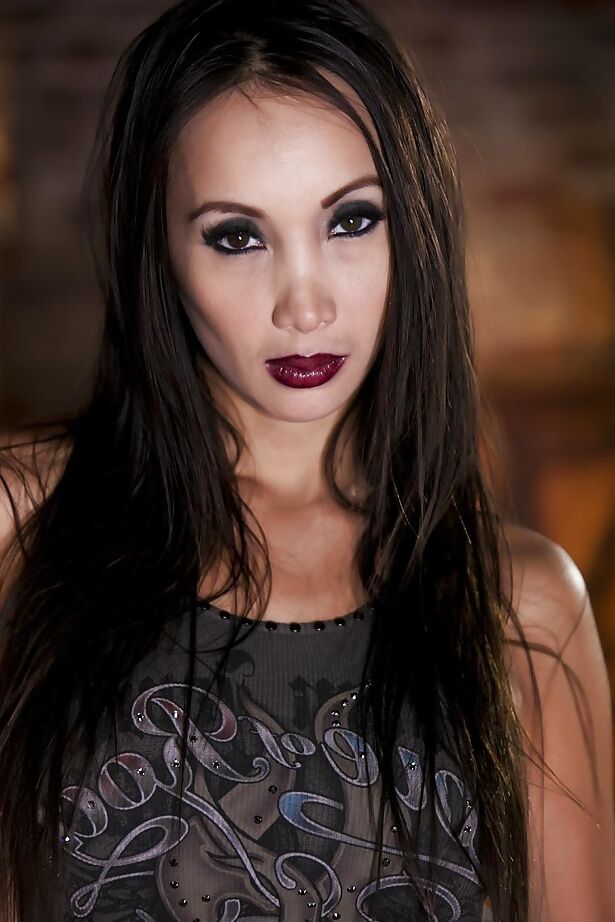 16P Fit Asian babe Katsuni is revealing her big tits while in jeans