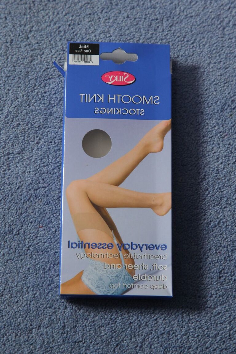 21P Beautiful busty Summer poses in smooth stockings after going topless