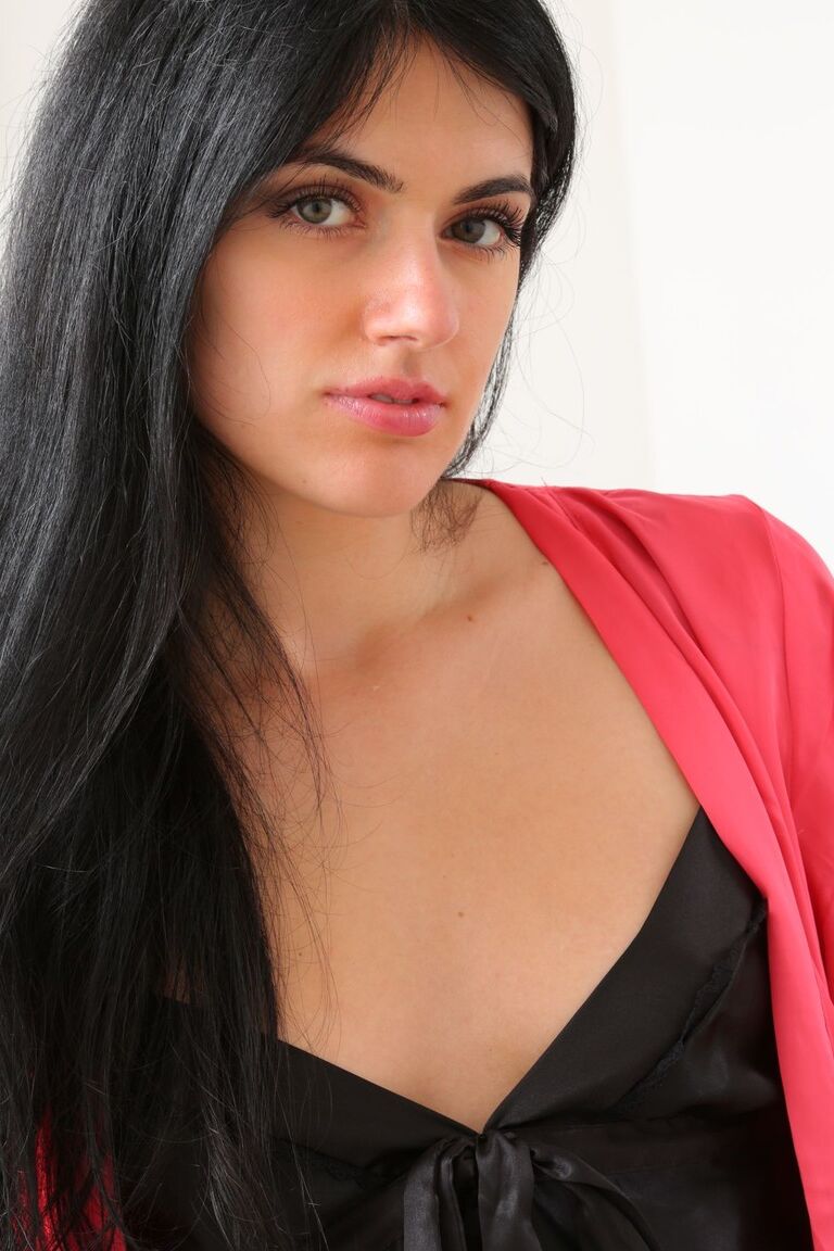 21P Dark haired beauty Nerissa teases in provocative lingerie while posing in bed
