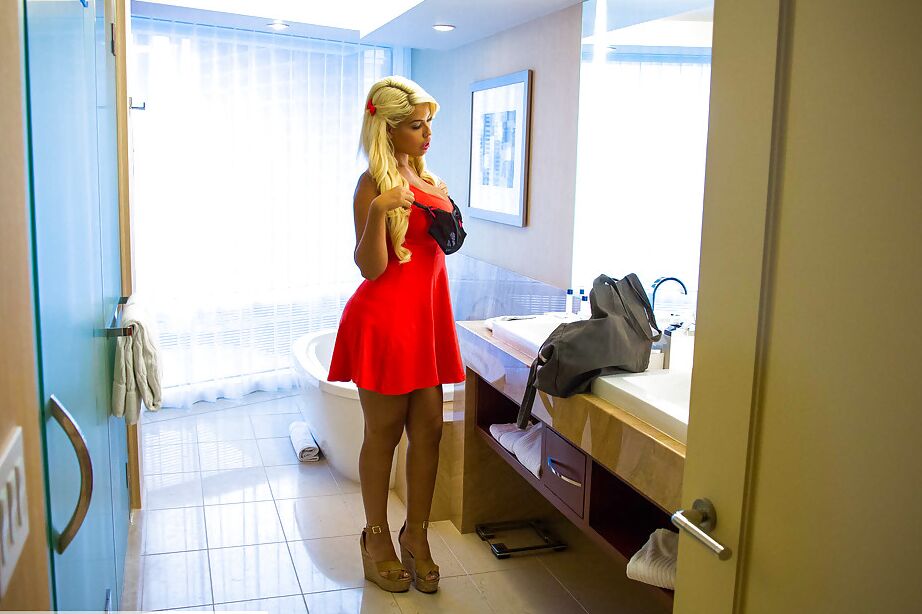 16P Amateur Latina model Bridgette B. changes into enticing lingerie