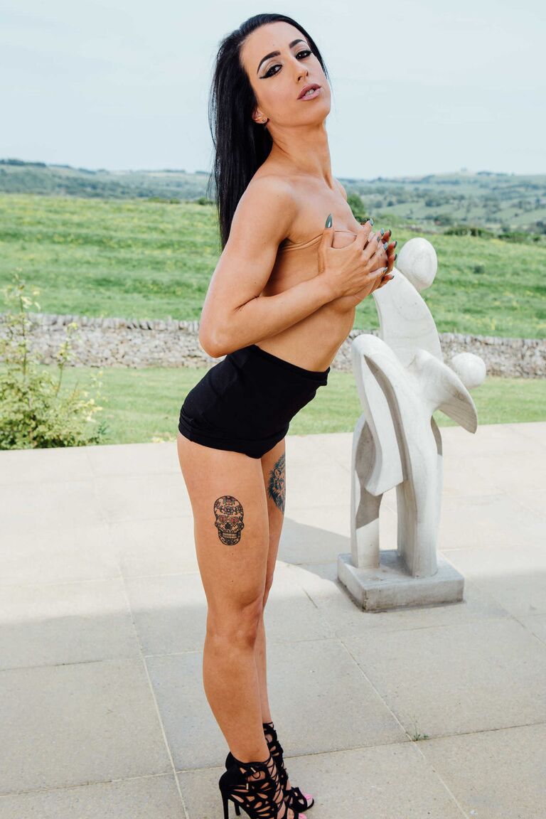 21P Dark haired babe with a slim figure Jasmine James flaunts her fakes outdoors