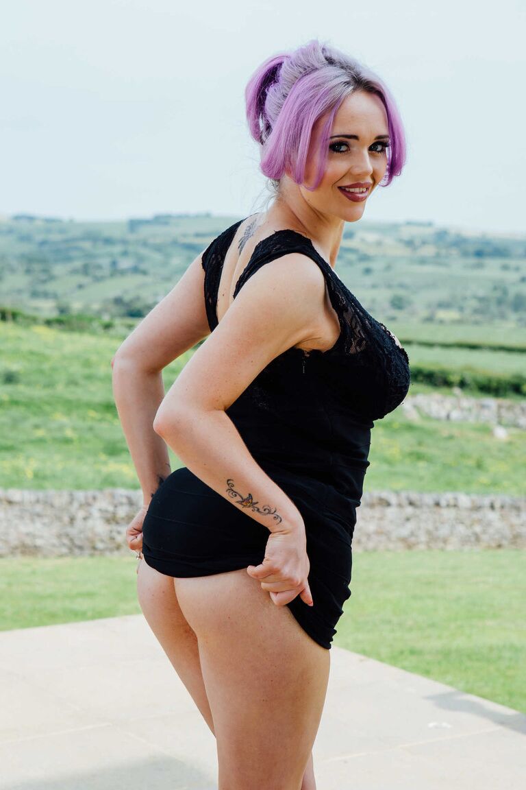 21P Dazzling British MILF Jasmine James flaunting her fake tits in nylons outdoors