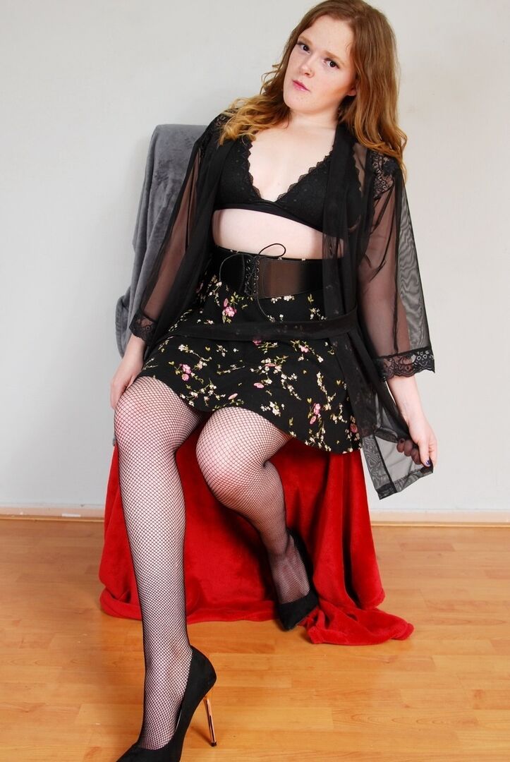 16P Natural redhead exposes her black underwear during upskirt action in nylons