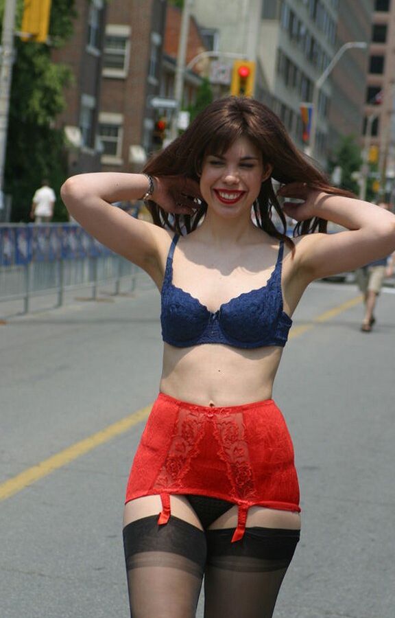 12P Amateur model wanders a public street in her underthings and a girdle