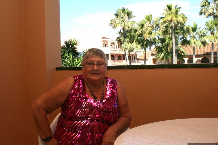 20P Obese grandmother GrandmaLibby parts her labia lips after disrobing on balcony