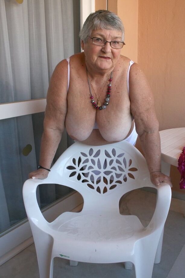 20P Obese grandmother GrandmaLibby parts her labia lips after disrobing on balcony