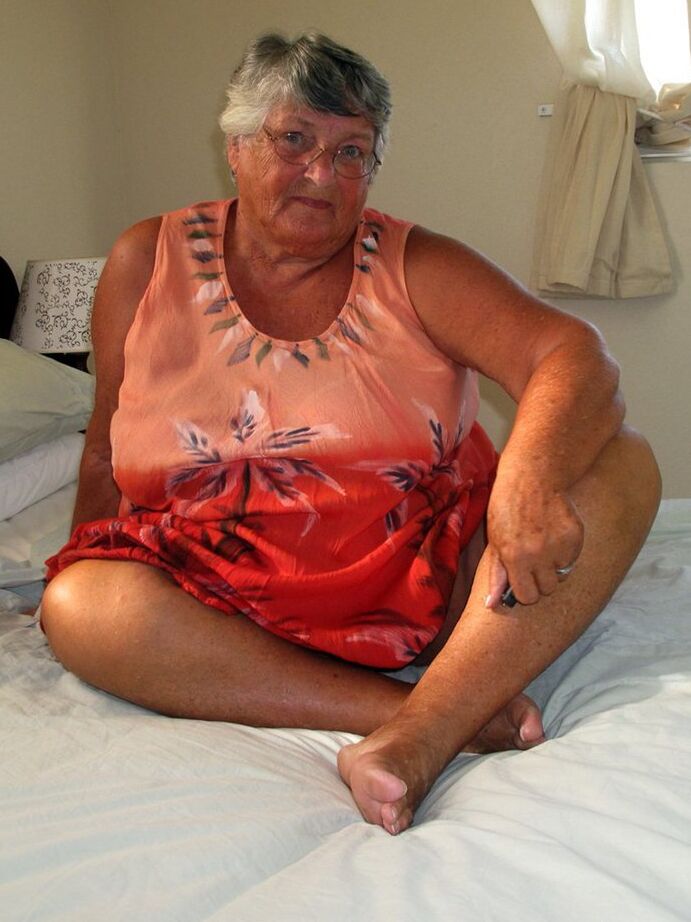 20P Fat old Grandma Libby licking her big nipples while spreading nude for closeup