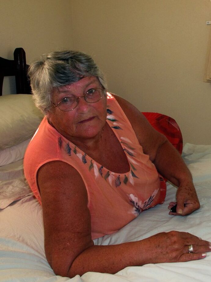 20P Fat old Grandma Libby licking her big nipples while spreading nude for closeup