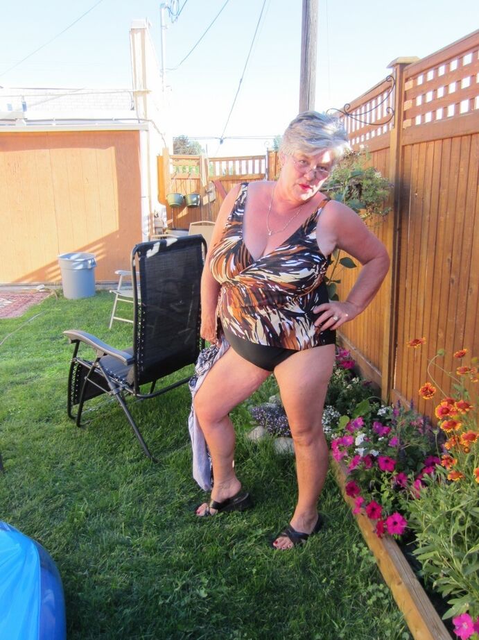 20P Fatty mature granny Girdle Goddess peels to enjoy wading pool skinny dip