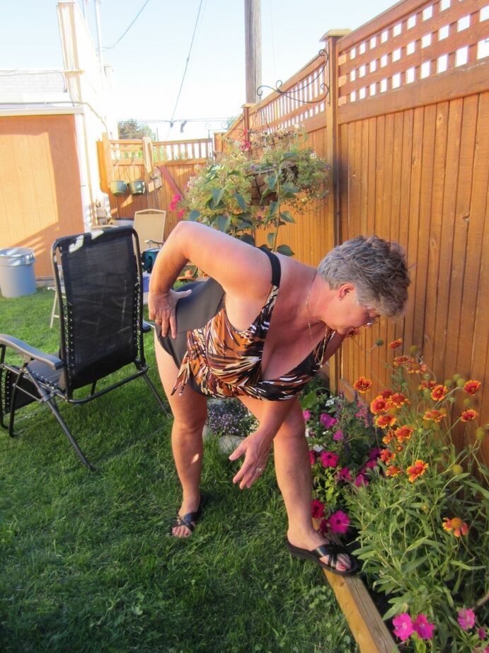 20P Fatty mature granny Girdle Goddess peels to enjoy wading pool skinny dip