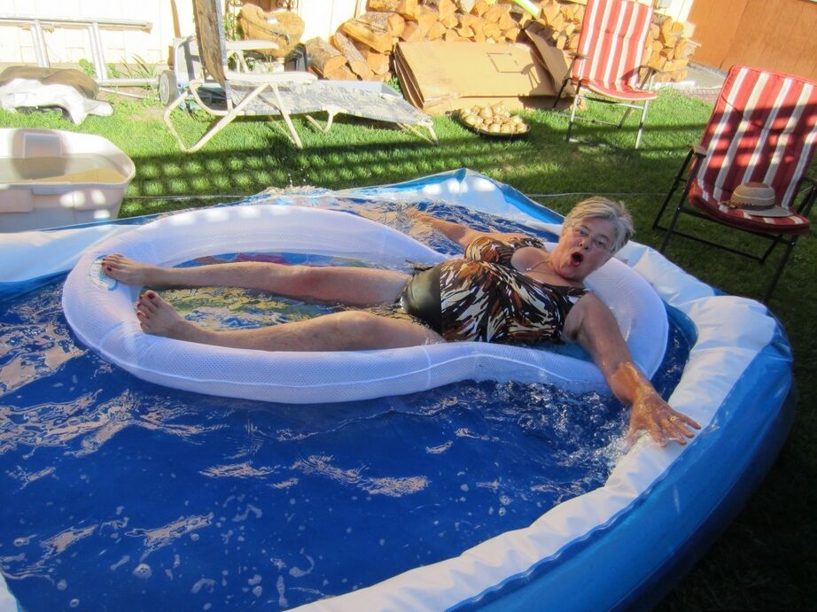 20P Fatty mature granny Girdle Goddess peels to enjoy wading pool skinny dip