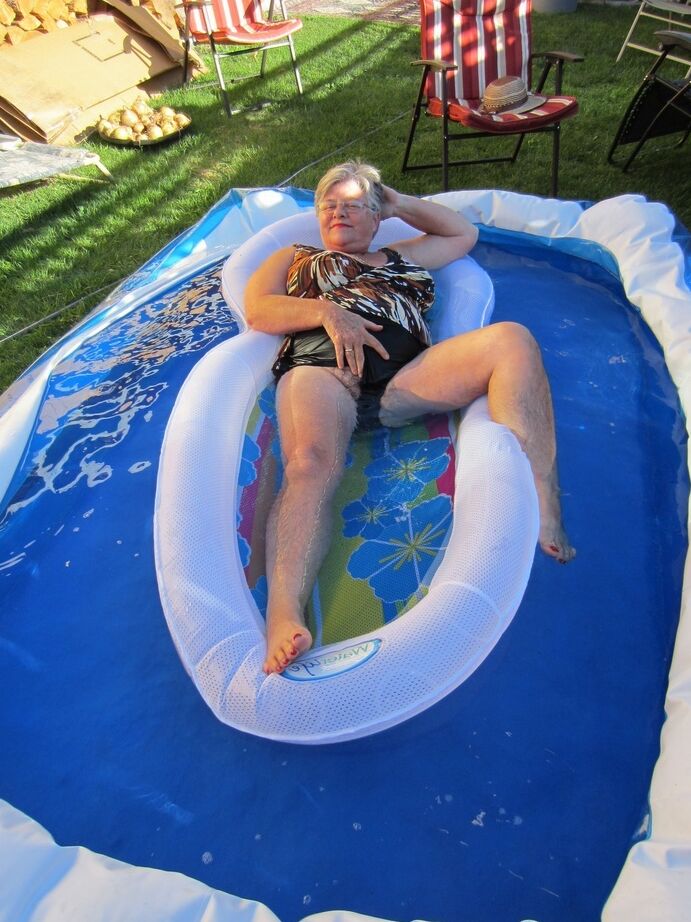 20P Fatty mature granny Girdle Goddess peels to enjoy wading pool skinny dip