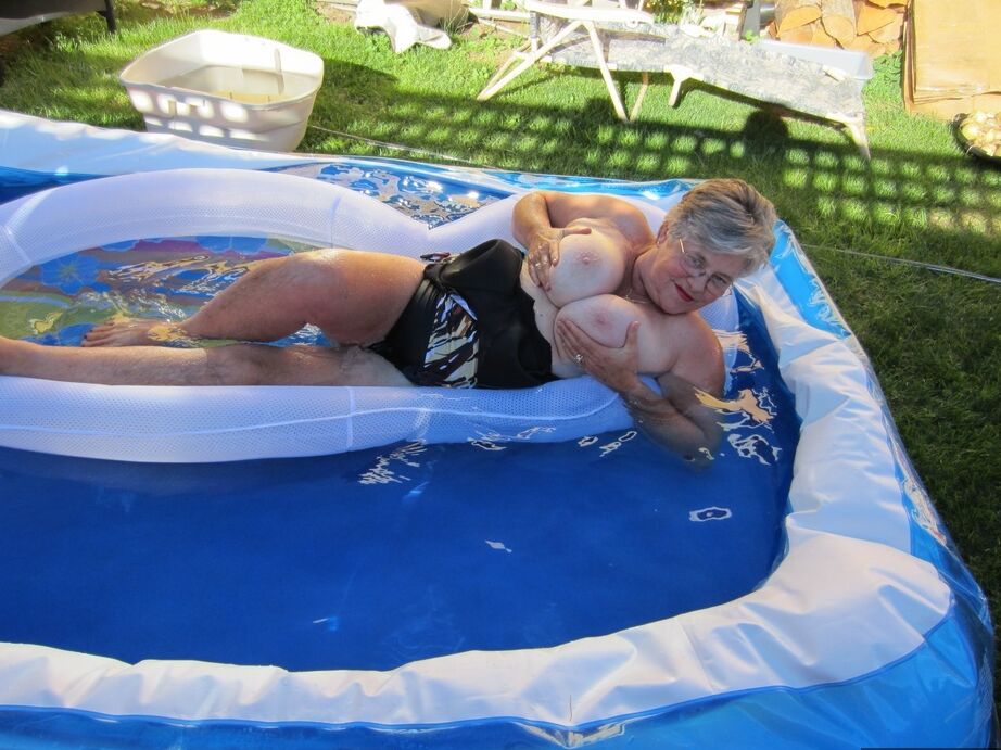 20P Fatty mature granny Girdle Goddess peels to enjoy wading pool skinny dip