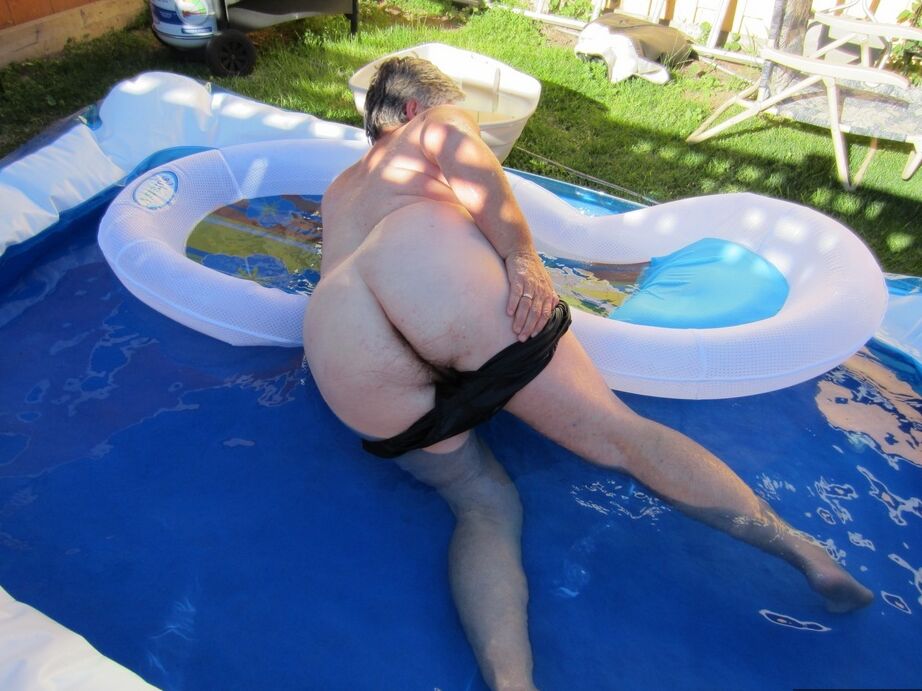 20P Fatty mature granny Girdle Goddess peels to enjoy wading pool skinny dip